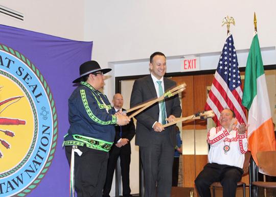 Taoiseach Leo Varadker playing traditional Choctaw game of stickball