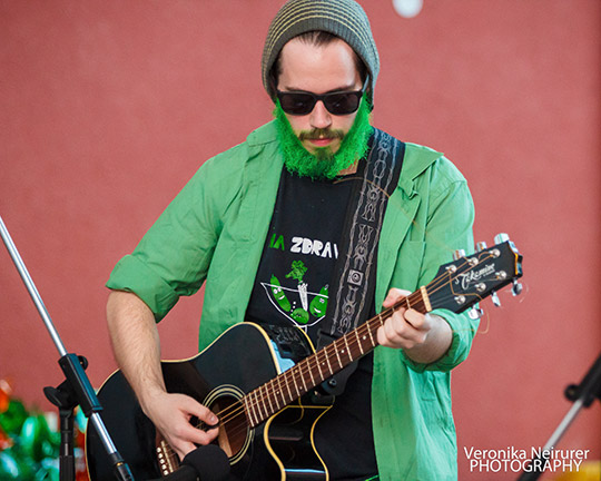 Man playing Guitar during St Patricks Day, Nitra (UKF) Slovak Republic